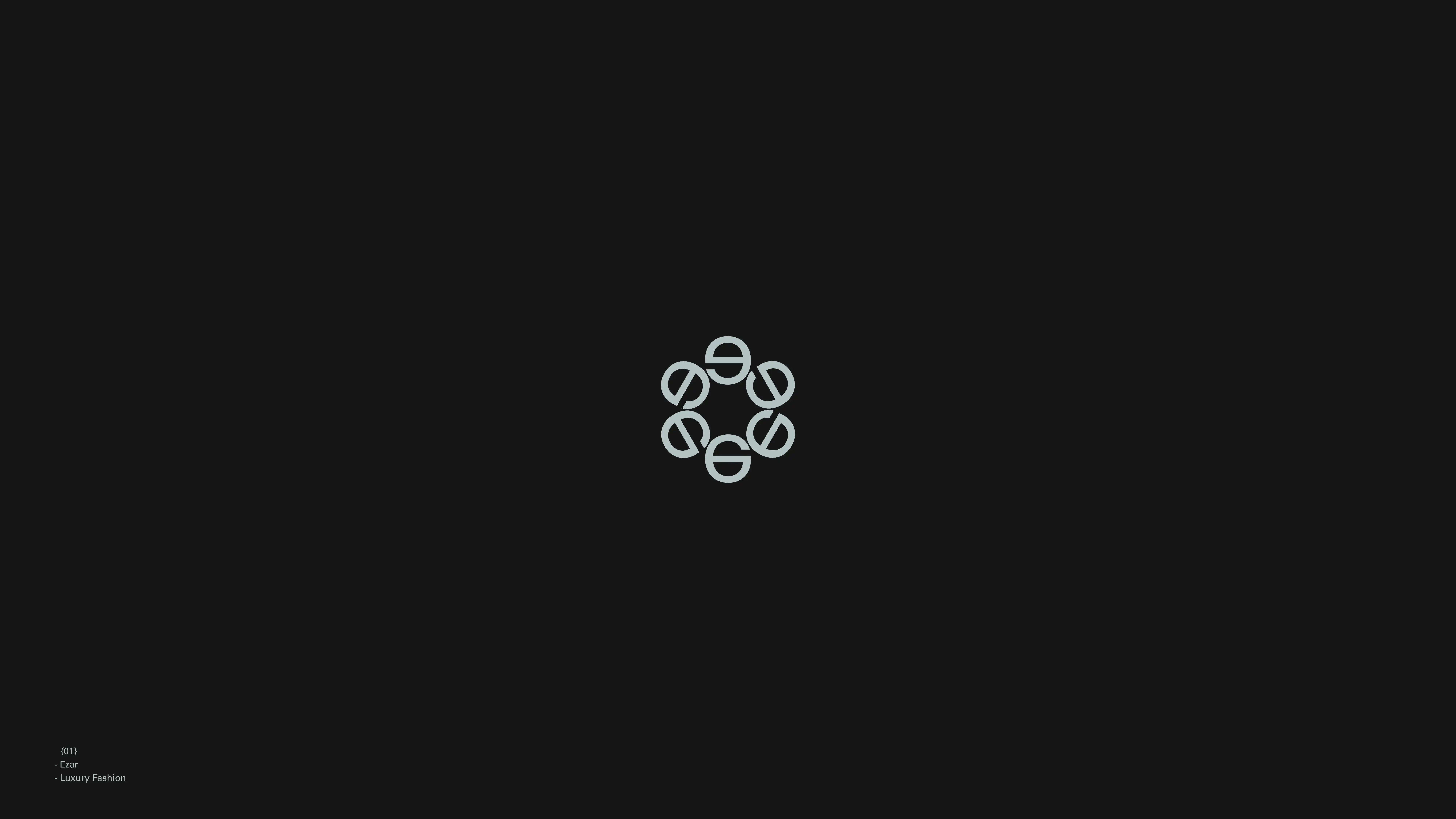 Circular Ezar monogram made from six repeated letterforms.